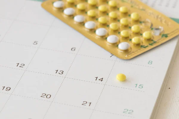 birth control pills of baby for woman and calendar