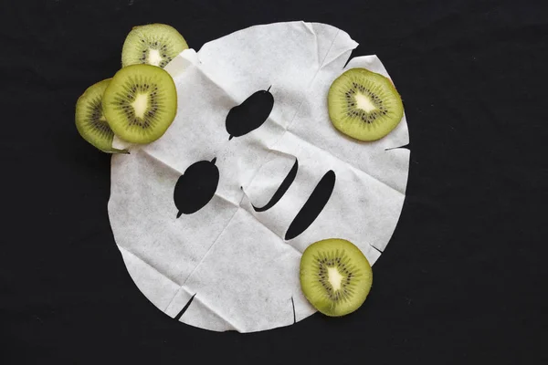 real nature sheet mask extracts from fruit kiwi for face skin care brightening pure nature on background black