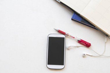 Ofis Büro iş için cep telefonu ile defter planlayıcısı takvim