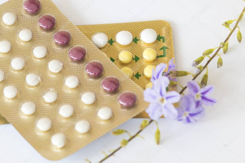 oral contraceptives woman for who do not want to have baby eat birth control pills with purple flowers 