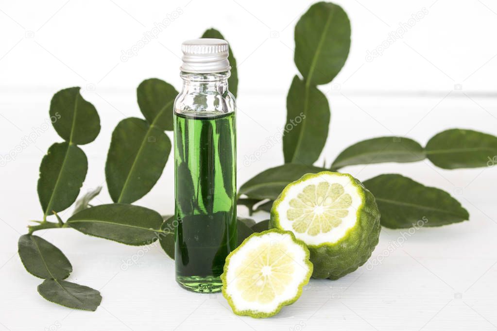 natural herbal oils from kaffir lime smell scents aroma on background white
