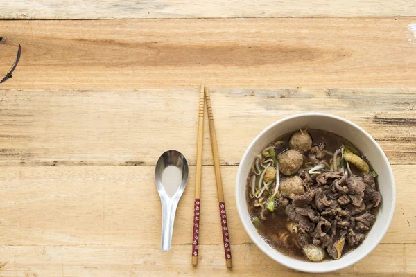 super foods noodle in soup with meat ball and beef prepare to eats delicious on background wooden