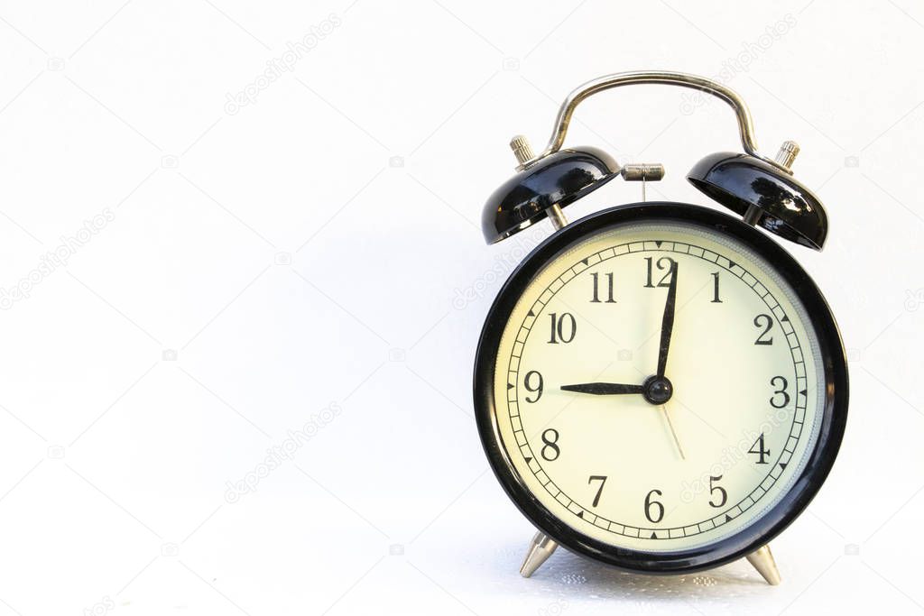 alarm clock on moring arragement flat lay style on background white 