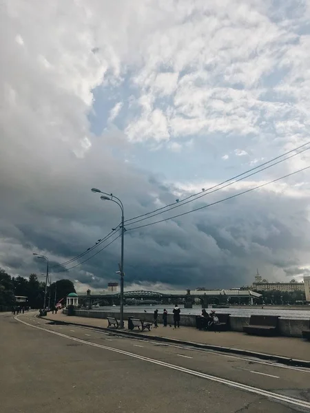 Moscow, Gorky Park. Huge storm clouds hang over the park.