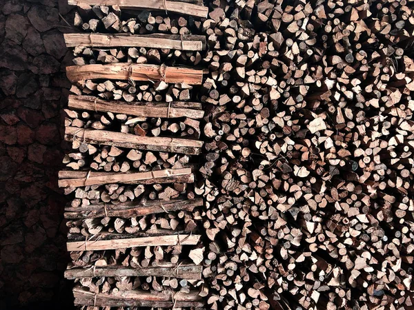 Background with a tree lined with logs. The woodpile. Top view with copy space