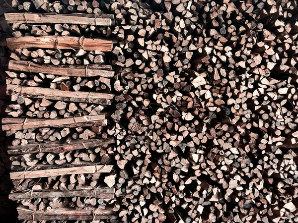 Background with a tree lined with logs. The woodpile. Top view with copy space