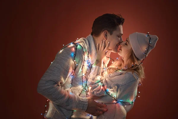 Young couple kissing and hugging each other — Stock Photo, Image