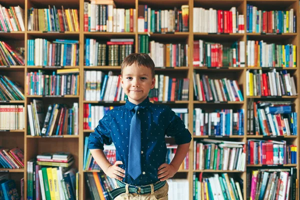 Boy in library — Stock Photo, Image