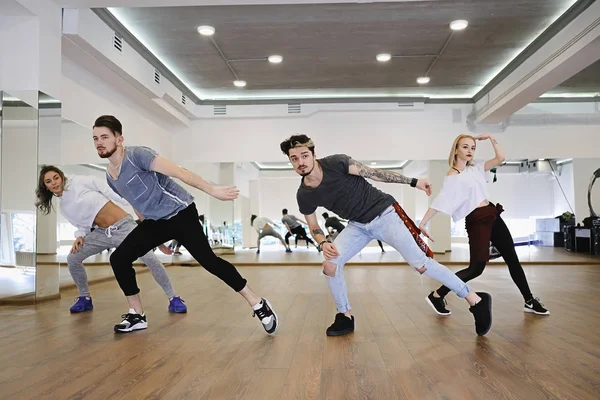 Group of four hip-hop dancers