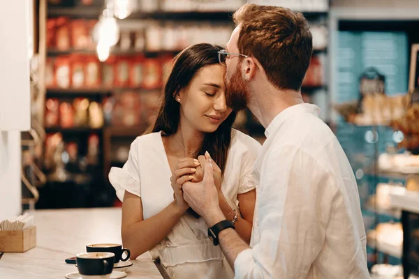 Loving couple in a coffee shop — Stock Photo, Image