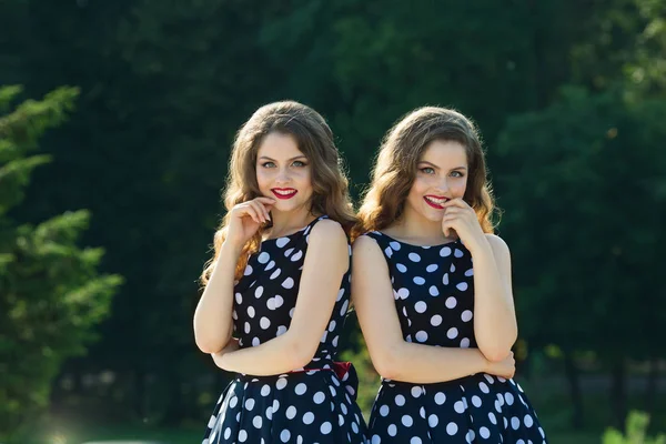 Two beautiful smiling girl sisters — Stock Photo, Image