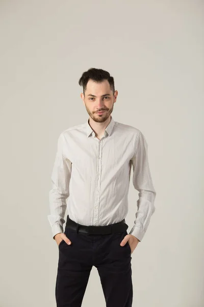 Young brunette man in white shirt — Stock Photo, Image