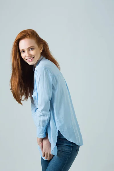 Beautiful young smiling girl with red hair — Stock Photo, Image