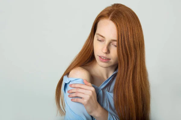 Beautiful young girl with red hair — Stock Photo, Image