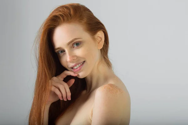 Beautiful young girl with red hair — Stock Photo, Image