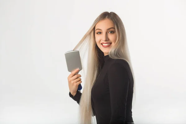 Beautiful Young Woman Long Hair White Background Combs Her Hair — Stock Photo, Image