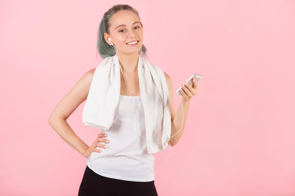 Beautiful Young Slim Woman Sportswear Pink Background Listens Music — Stock Photo, Image