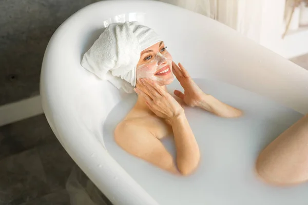 Beautiful Young Woman Towel Her Head Lies Bath Milk — Stock Photo, Image