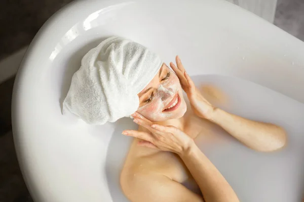 Beautiful Young Woman Towel Her Head Lies Bath Milk — Stock Photo, Image