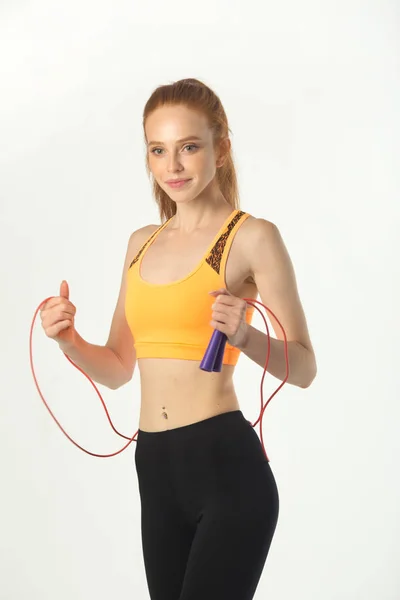 Beautiful Young Slim Woman Red Hair Sportswear White Background Skipping — Stock Photo, Image