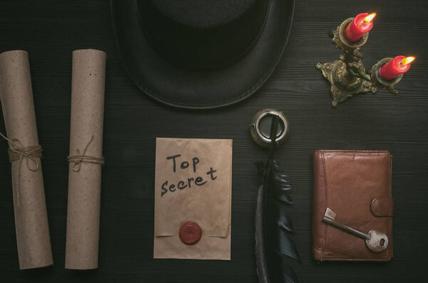 Top secret document information. Privacy. Forbidden material. Key to unraveling. Secret clue concept background.