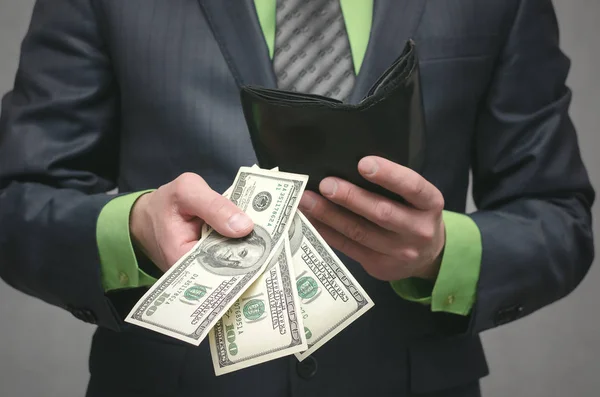 Homem Negócios Está Mãos Dadas Com Dinheiro Dinheiro Ajuda Financeira — Fotografia de Stock