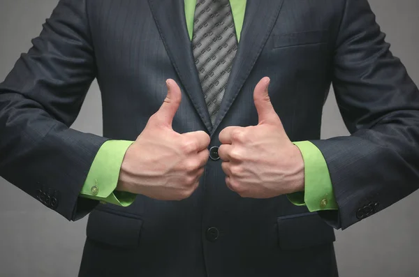 Επιχειρηματίας Δείχνει Ένα Μπράβο Δάχτυλα Δύο Χέρια Του Μπροστά Από — Φωτογραφία Αρχείου