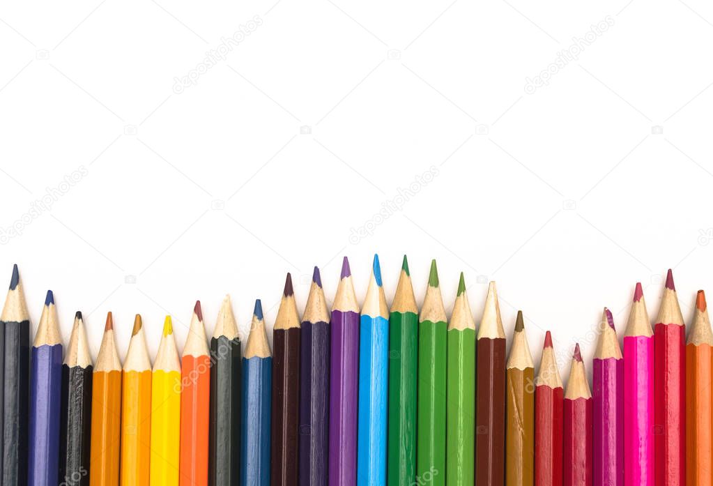 Color pencils isolated on white background with copy space. Drawing set flat lay.