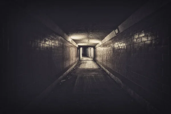 Empty tunnel at night, desaturated colors — Stock Photo, Image