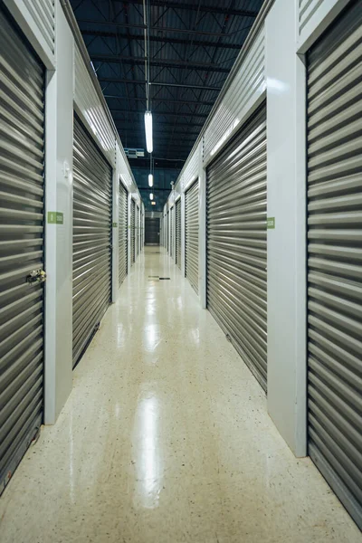 Long Storage Facility Corridor Garage Doors Light — Stock Photo, Image