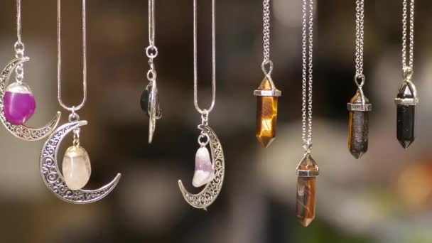 Miscellaneous Silver Necklaces Various Shapes Colors Set Colored Stones Blurred — Stock Video