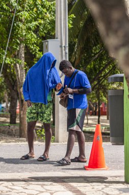 Bayahibe 10 kasabasındaki günlük yaşam sahnesi