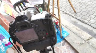 BAYAHIBE, DOMINICAN REPUBLIC 22 JANUARY 2020: Painter artist painting on Bayahibe streets