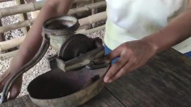 MONTANA REDONDA, DOMINICAN REPUBLIC 3 JANUARY 2020: Grind the coffee