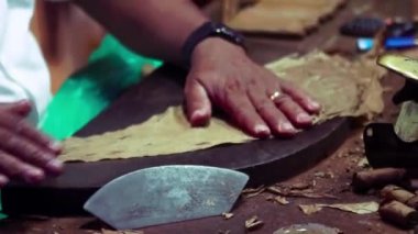 BAYAHIBE, DOMINICAN REPUBLIC 8 JANUARY 2020: Cigar manufacturing hand made 2