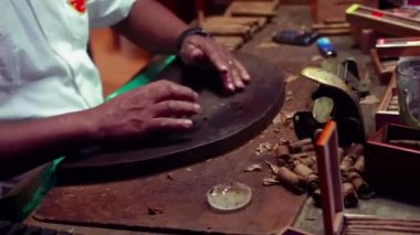 BAYAHIBE, DOMINICAN REPUBLIC 8 JANUARY 2020: Cigar manufacturing hand made 6