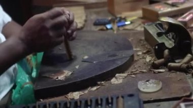 BAYAHIBE, DOMINICAN REPUBLIC 8 JANUARY 2020: Cigar manufacturing hand made 9