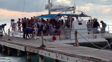 BAYAHIBE, DOMINICAN REPUBLIC 8 JANUARY 2020: Catamaran full of tourists in Bayahibe to saona 2