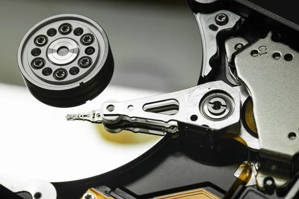 Detail of the inside of a hard disk with the reading head in operation