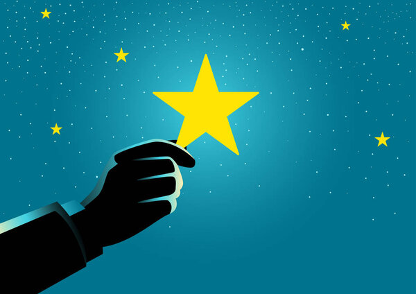 Деловой человек берет в руки звезду
