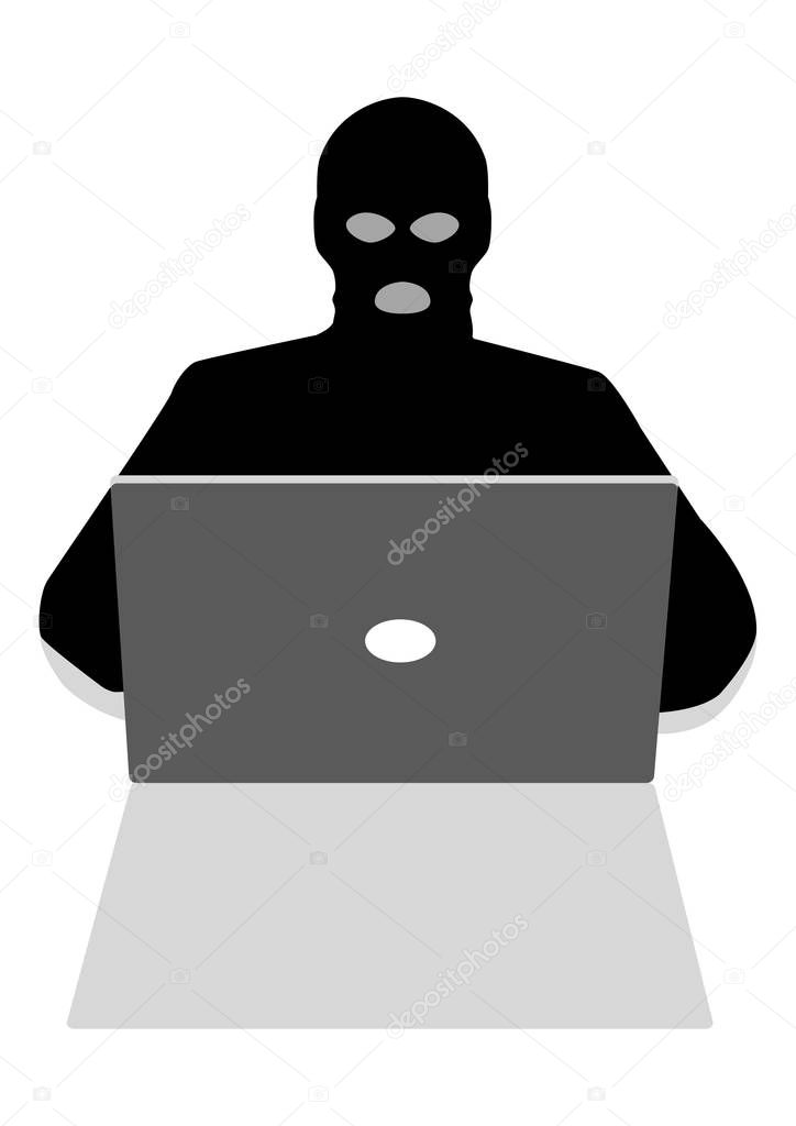 Hacker behind laptop computer