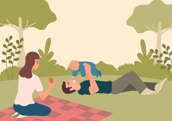 Mutlu bir aile parkta bebekleriyle oynuyor. — Stok Vektör
