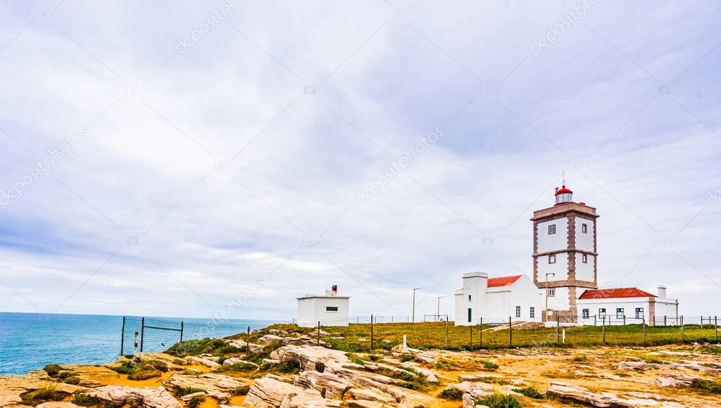 View on lighthouse on Cabo Carvoeiro and Atlantic ocean next to Peniche, Portugal