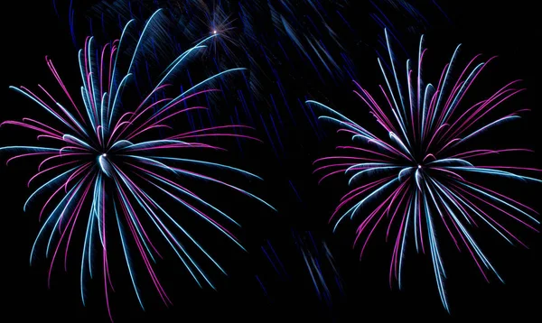 Fogos de artifício mágicos fundo de ano novo — Fotografia de Stock