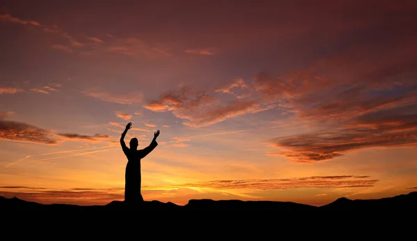 Statue of Jesus over beautiful sunset — Stock Photo, Image