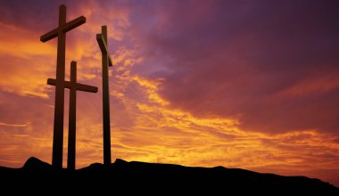 Three crosses on over dramatic sky panoramic view clipart