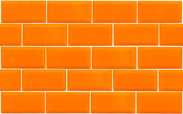 Фон на стене из оранжевой плитки — стоковое фото