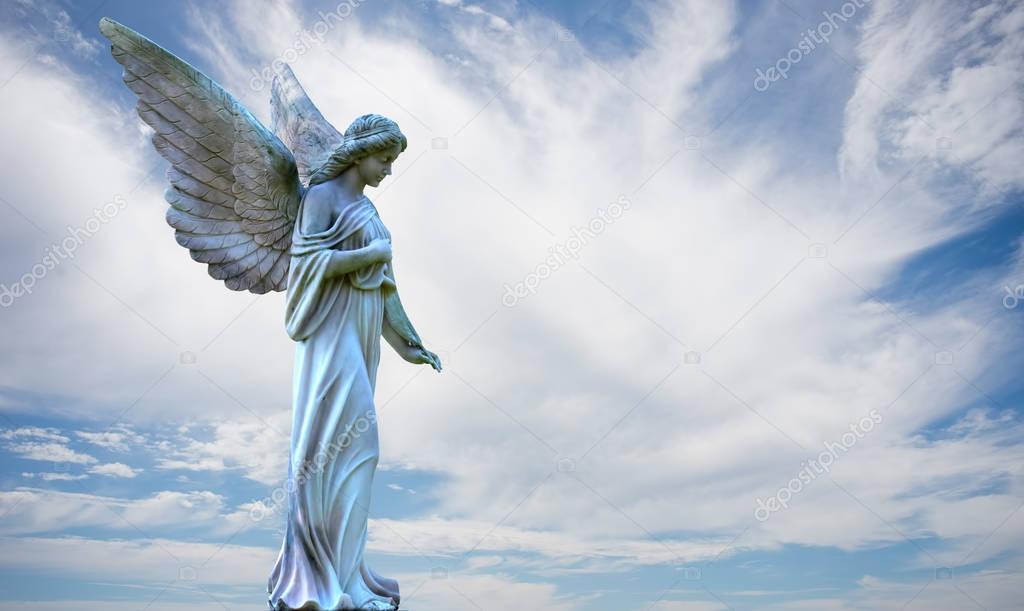 Beautiful angel in heaven over cloudy sky