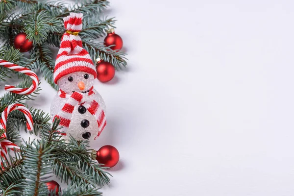 New Year background with snowman and fir tree — Stock Photo, Image