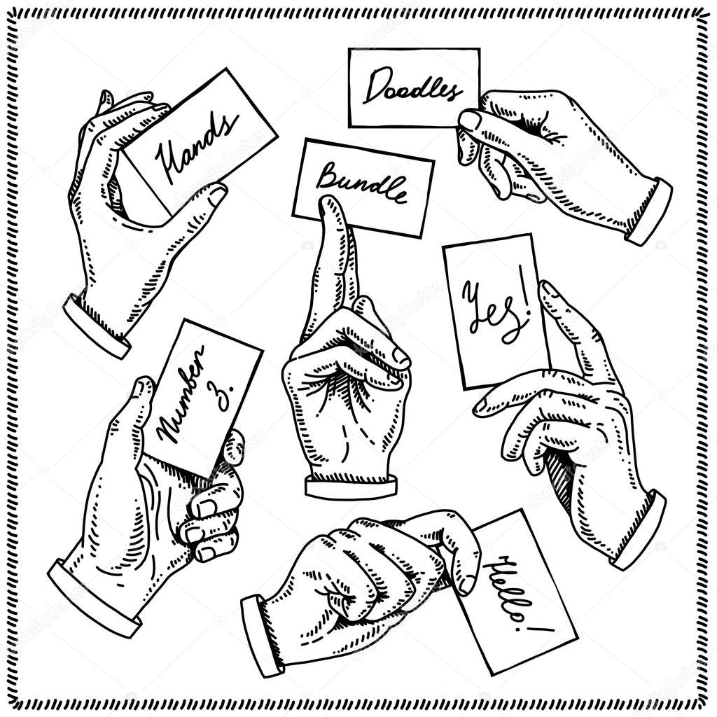 Hands doodles holding card.
